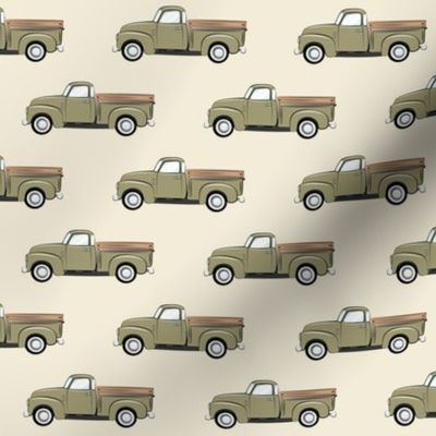 vintage green truck on dark cream