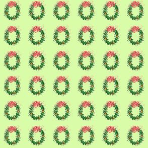 green wreath with oranges on light green background