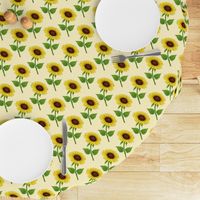 Sunflowers on light yellow