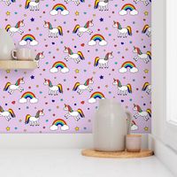 unicorns with rainbows (primary) on light purple