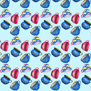 Cups scattered-sky-blue background-ch-ch-ed