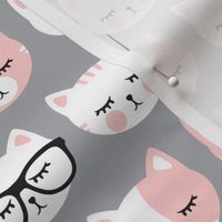 cat faces - light pink on grey