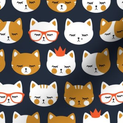 cat faces on dark blue