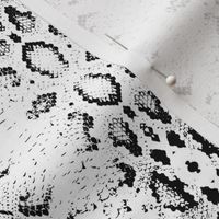 Snake skin texture. Seamless pattern black on white background. 