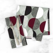 Abstract Circles in Black and White With Burgundy Geometric on Green