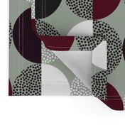 Abstract Circles in Black and White With Burgundy Geometric on Green