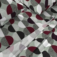 Abstract Circles in Black and White With Burgundy Geometric on Green