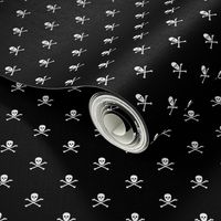 white skull and crossbones on black