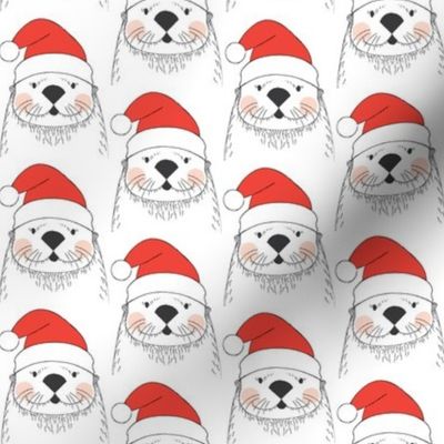 white otters with santa hats