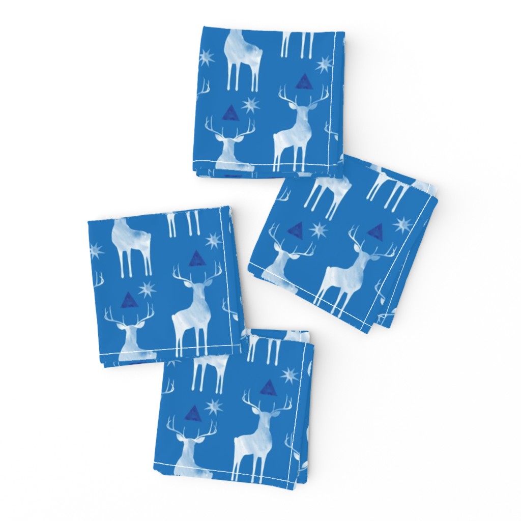 Whitetails in winter, on Blue