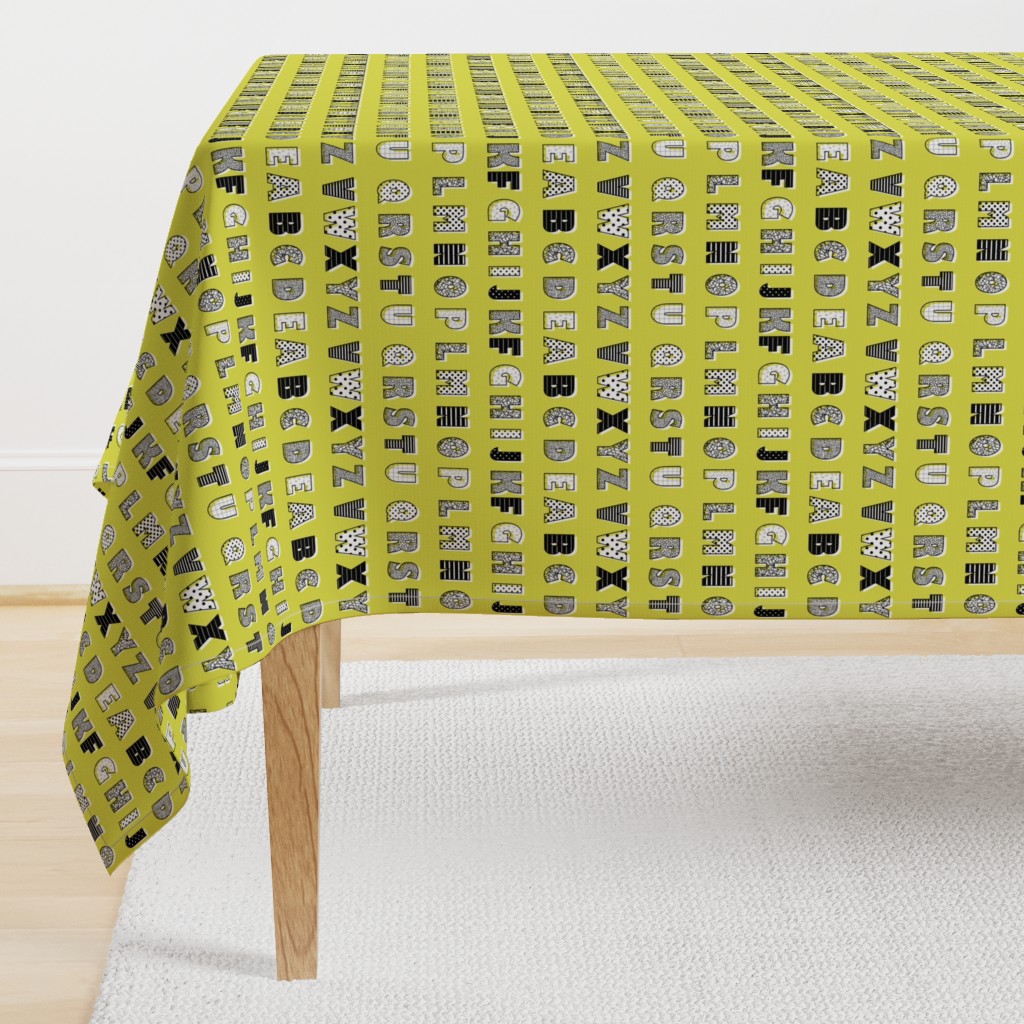 Alphabet pattern mustard