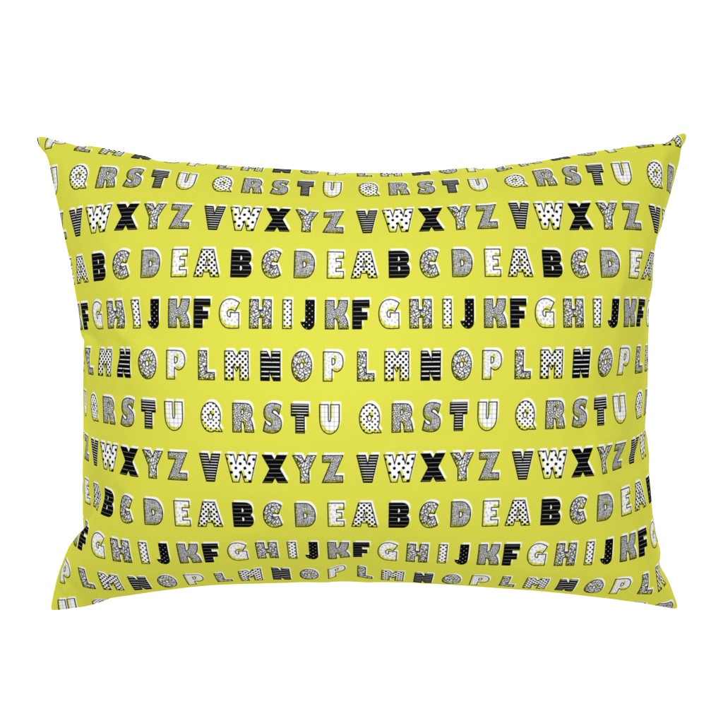 Alphabet pattern mustard