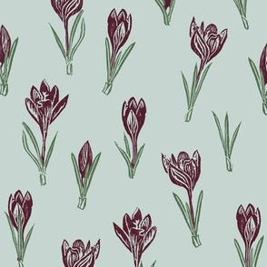 dark red crocuses on light greyed teal