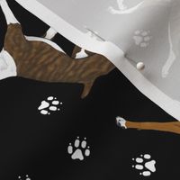 Trotting Boxers and paw prints - black