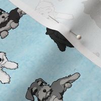 Cartoon Schnauzers on Blue Cloudy Background large