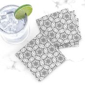 small snowflake hexagons in greyscale  - ELH