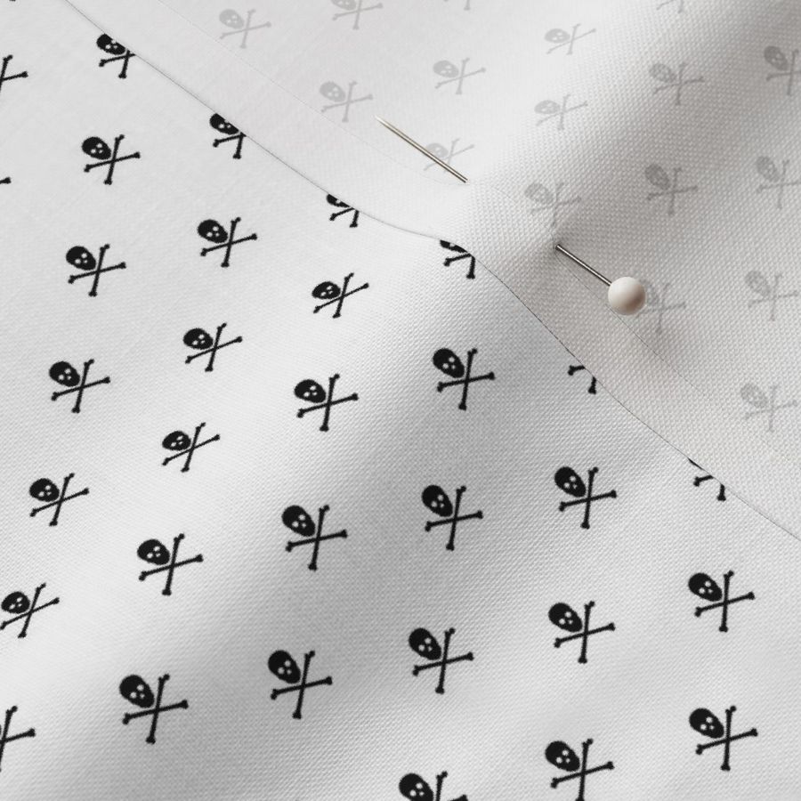 tiny black skull and crossbones on white