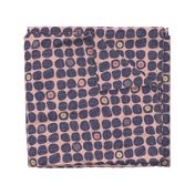 Blue irregular shaped dots on a pink background. Distressed look.