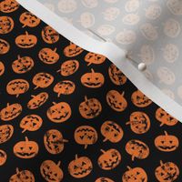 (micro scale) Jack-o'-lantern - pumpkins on black - halloween 