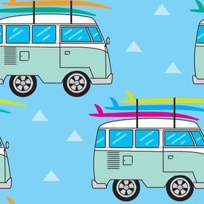 camper-van-and-surfboards-on-blue