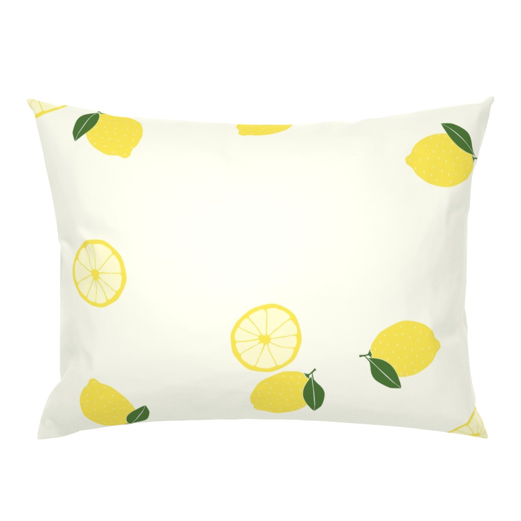 large - bright yellow lemons on yellow