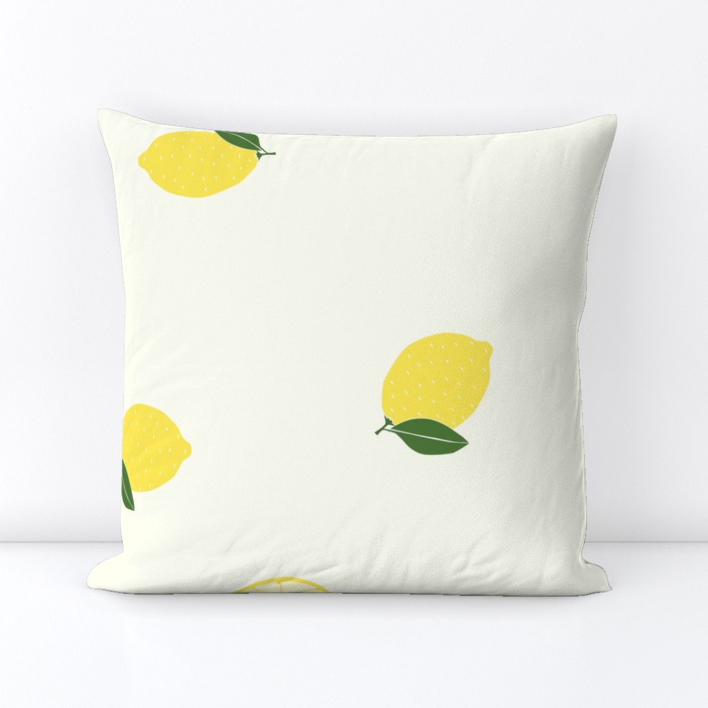 large - bright yellow lemons on yellow