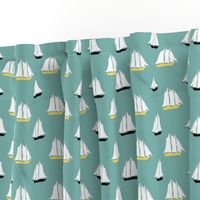 Sailboats on aqua blue