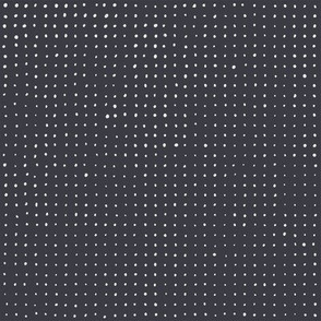 Light grey dots on dark grey