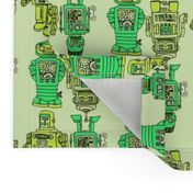 Playful Wind Up Tin Toy Robots in green