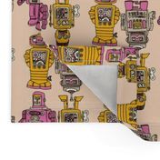 Playful Wind Up Tin Toy Robots (pink and yellow)