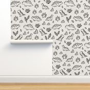 Sketchy tropical leaves, rocks and ancient dinosaurs design. Cute black and white dino pattern.