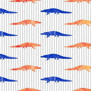 alligators - bright blue and orange on stripes