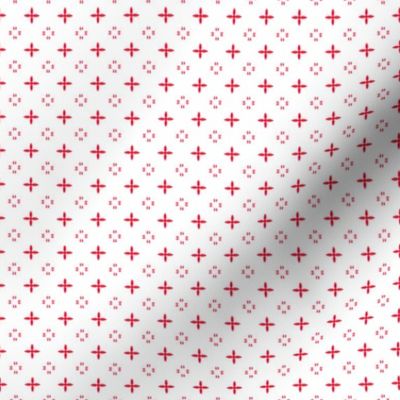 Ditsy print in a deep Christmas red on white