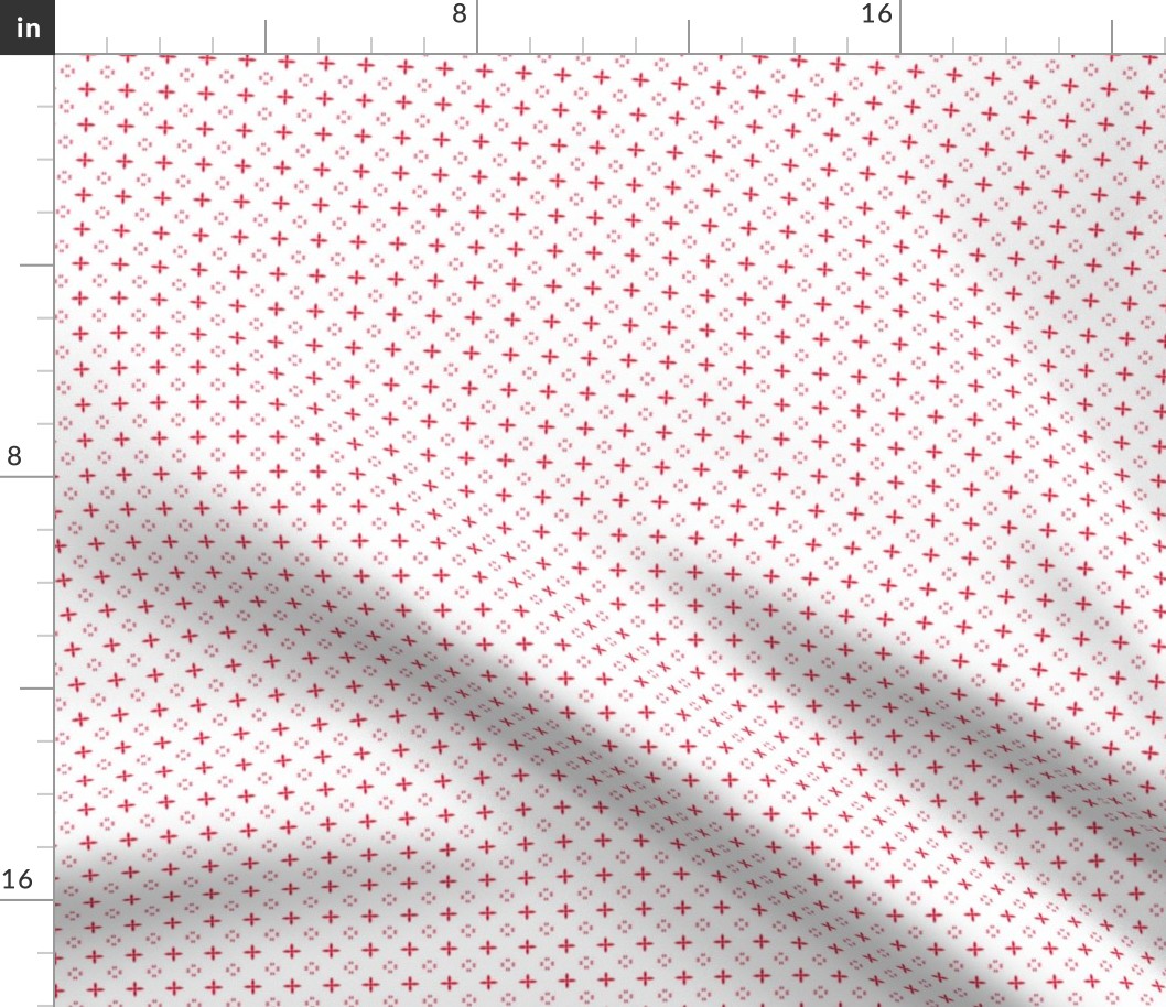 Ditsy print in a deep Christmas red on white