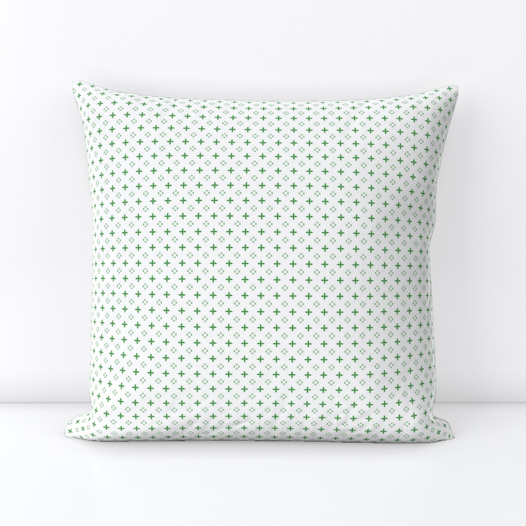 Ditsy print in a deep Christmas green on white
