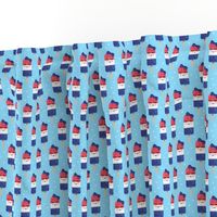 (small scale) red white and blue popsicles - happy face - on blue 