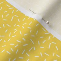 White Sprinkles on bright yellow - tiny scale
