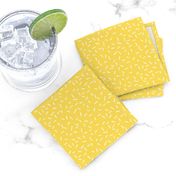 White Sprinkles on bright yellow - tiny scale