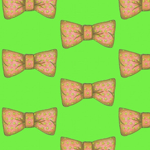 Tempo's  orange bow tie on green