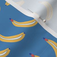 Bananas lined up on a blue background. Bananas in a row. Fruit pattern. 