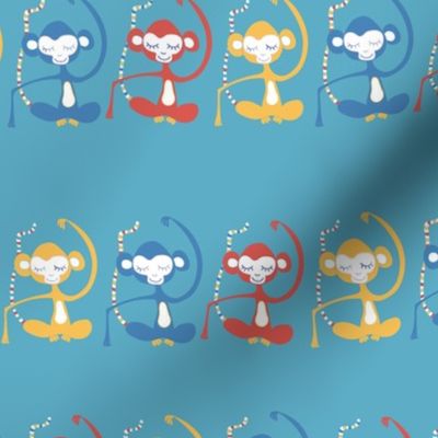 Meditating monkeys in a row on a blue background.