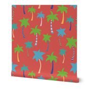 Palm trees on a red background. Colorful palm trees. Green, blue, teal, yellow, and white palm trees on red. Tropical pattern. Summer print.