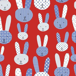 Bunnies blue and white on a red background. Collage bunnies. Doodle bunny. Blue rabbit. Cute babies and children's fabric