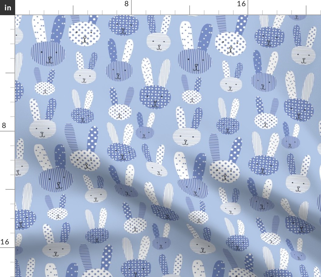 Doodle bunnies blue and white. Collage bunnies. Doodle bunny. Blue bunnies on a light blue background. Blue rabbit. Cute babies and children's fabric.