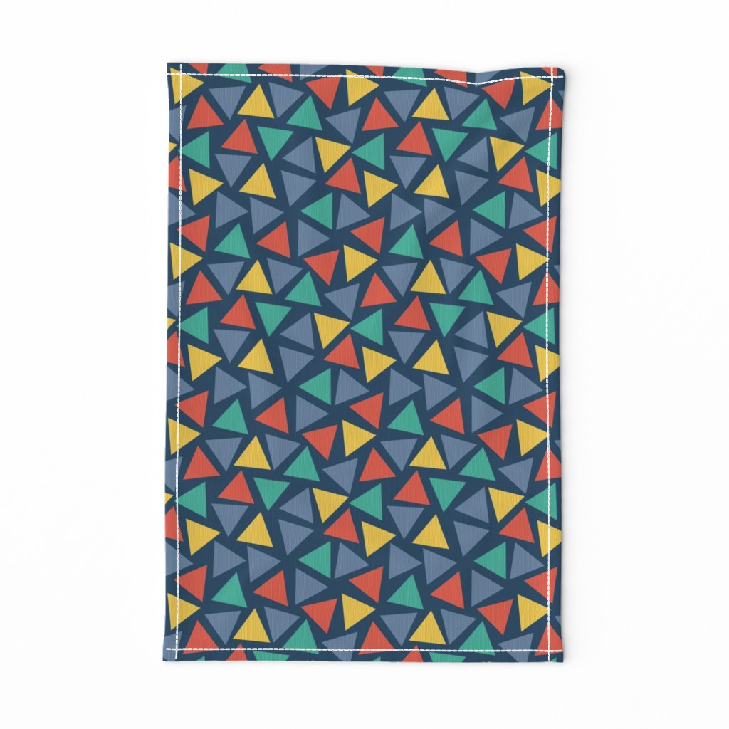 Red yellow blue teal turquoise triangles on a dark blue background. Scattered triangles. Randomly placed triangles. Geometric print. 