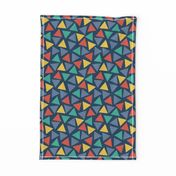 Red yellow blue teal turquoise triangles on a dark blue background. Scattered triangles. Randomly placed triangles. Geometric print. 