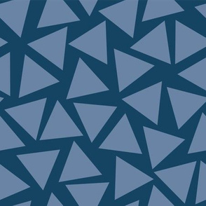 Blue triangles. Scattered light blue triangles on a dark blue background. Randomly placed triangles. Geometric pattern.