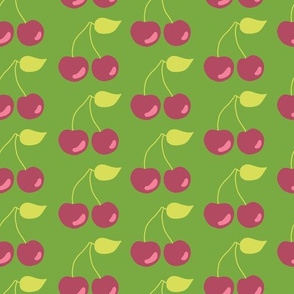Pairs of cherries on a green background