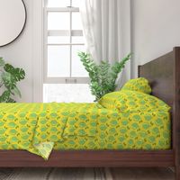 Limes in a row on a yellow background