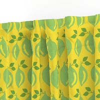 Limes in a row on a yellow background